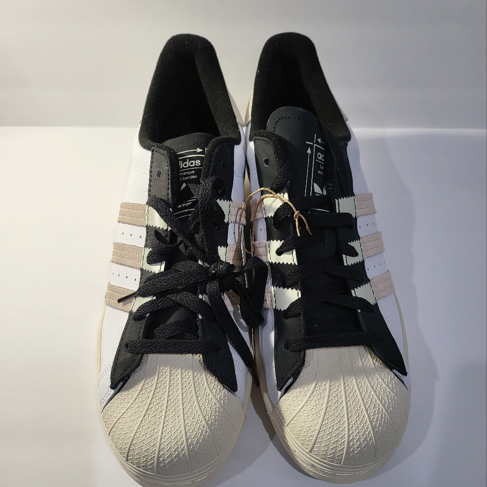 Man's Adidas Superstars extended stripes